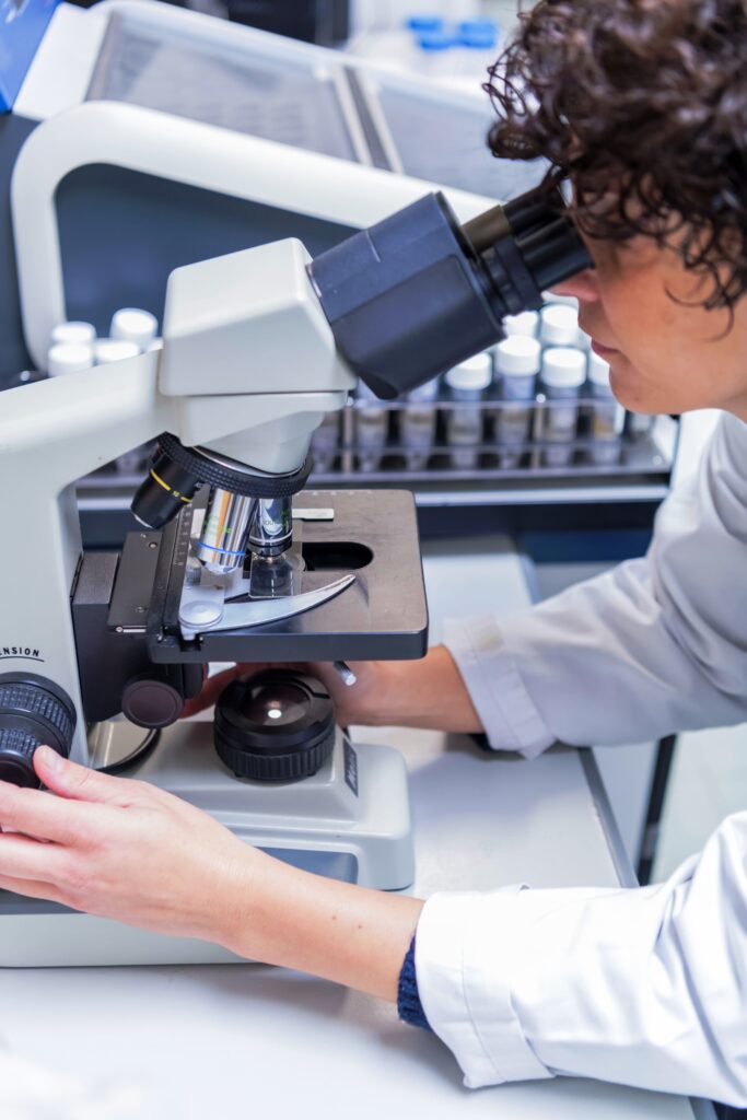 A woman with a microscope